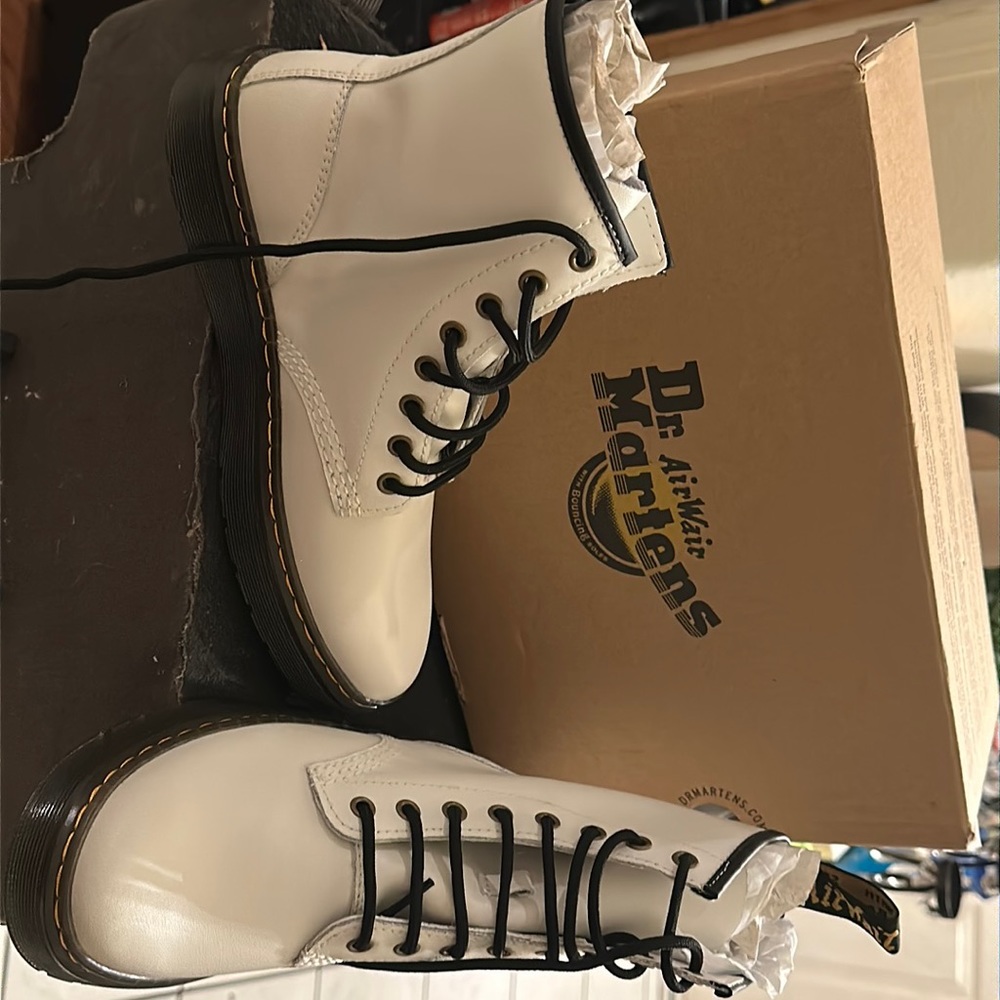 Brand new in the box. White Docs